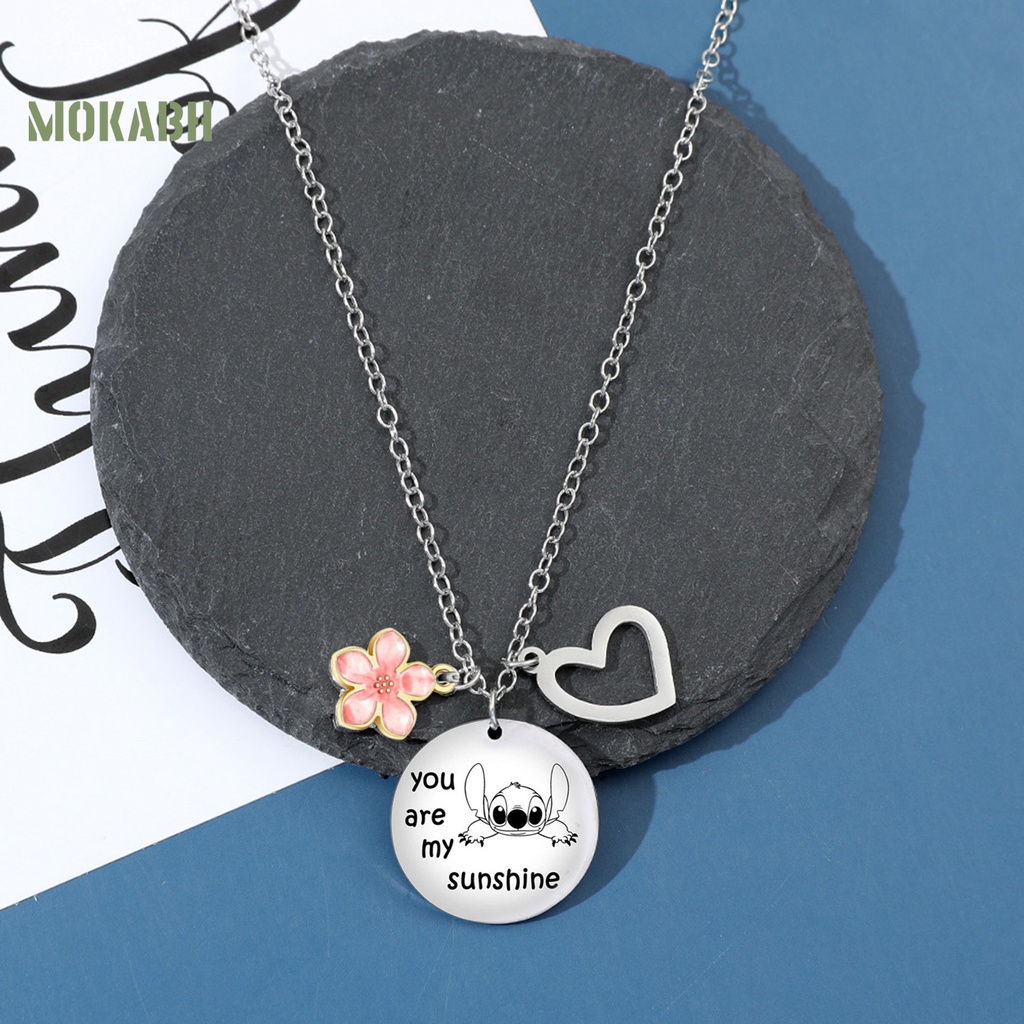 Vòng Cổ Bằng Thép Titan Mặt Hình Trái Tim Và Hoa Cá Tính