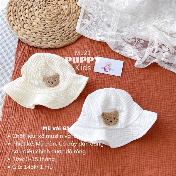 Mũ dành cho em bé  Mũ vải hoa tròn.