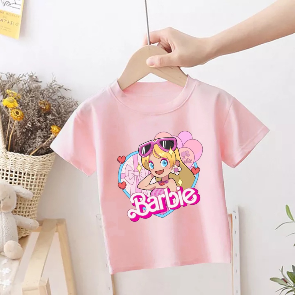 Áo Thun Tay Ngắn In Hình Búp Bê barbie Màu Hồng Thời Trang Cho Bé Gái Từ 1-12 Tuổi