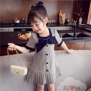 Váy caro đen xòe đuôi cá nơ ngực xinh xắn dành cho bé gái 8-25kg