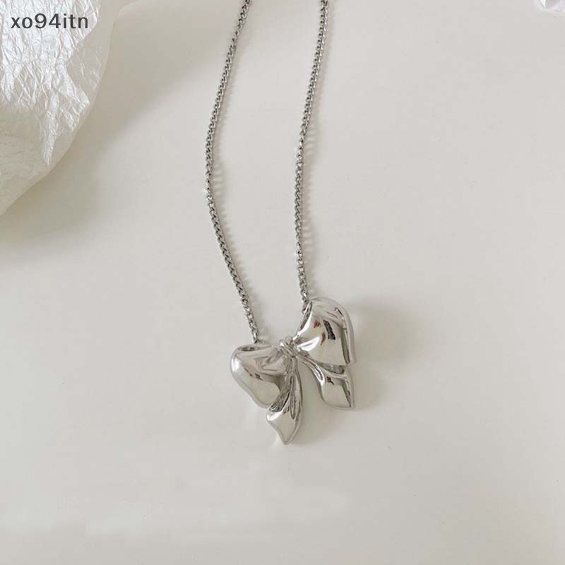 Vòng Cổ Choker Bằng Kim Loại Mặt Hình Nơ Đính Ngọc Trai Thời Trang Cho Nữ