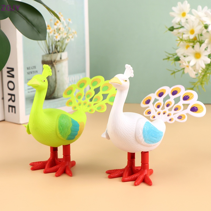 Đồ Chơi Lên Dây Cót Hình Chim Công Dễ Thương Cho Bé Mới