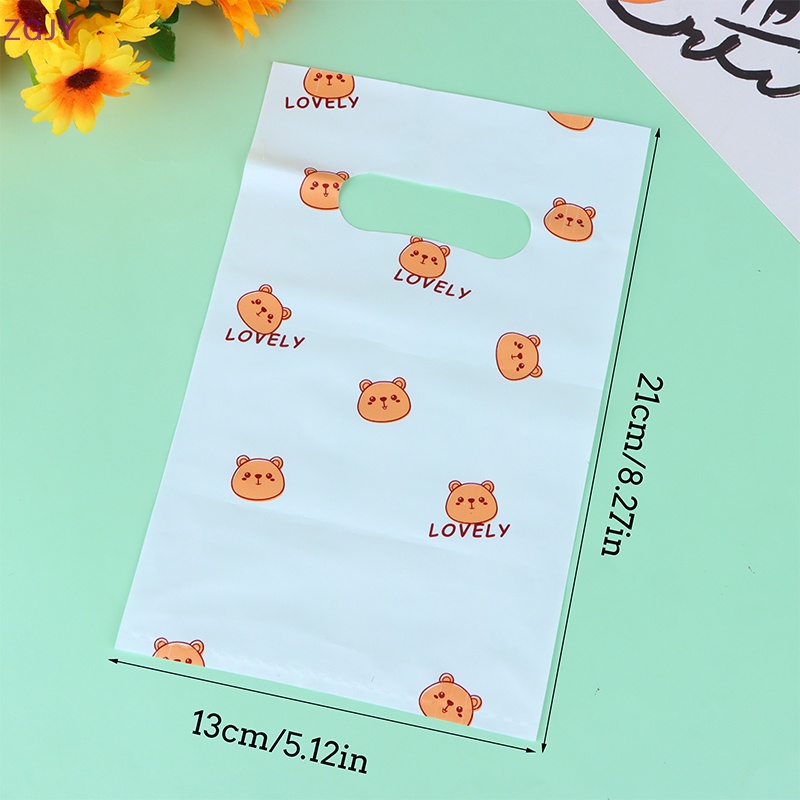 Set 10 Túi Nhựa Đựng Quà Mini In Họa Tiết Hoa Cúc / Gấu Đào Có Tay Cầm Mới