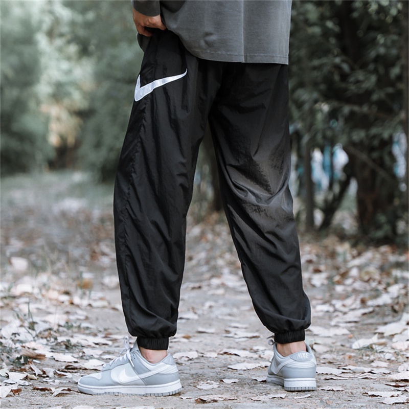 Quần Dài Thể Thao Thêu Logo Nyke 100% Chính Hãng Chất Liệu Nylon Co Giãn Thời Trang Cho Nam Và Nữ