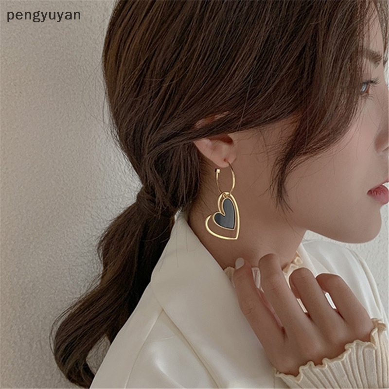 1 Đôi Bông Tai Dài Hình Trái Tim Màu Vàng Thời Trang Dành Cho Nữ