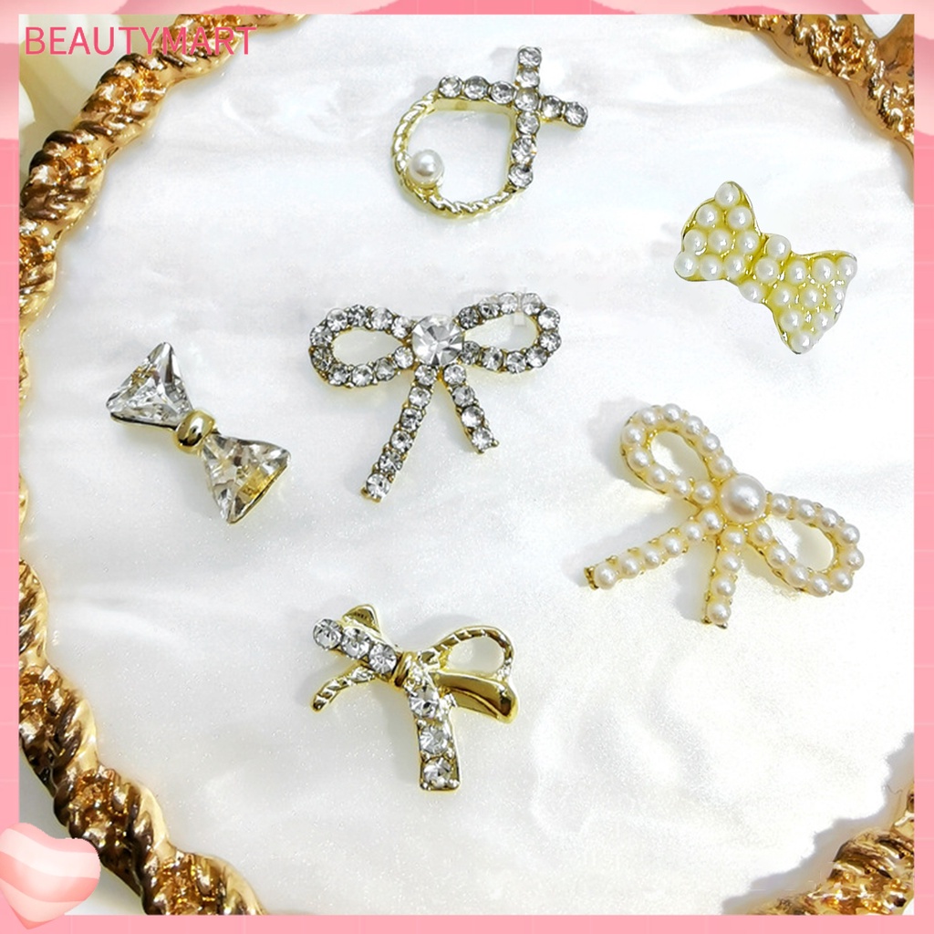 Set 10 Phụ Kiện Trang Trí Móng Tay Hình Nơ 3D Đính Đá / Ngọc Trai Giả Lấp Lánh