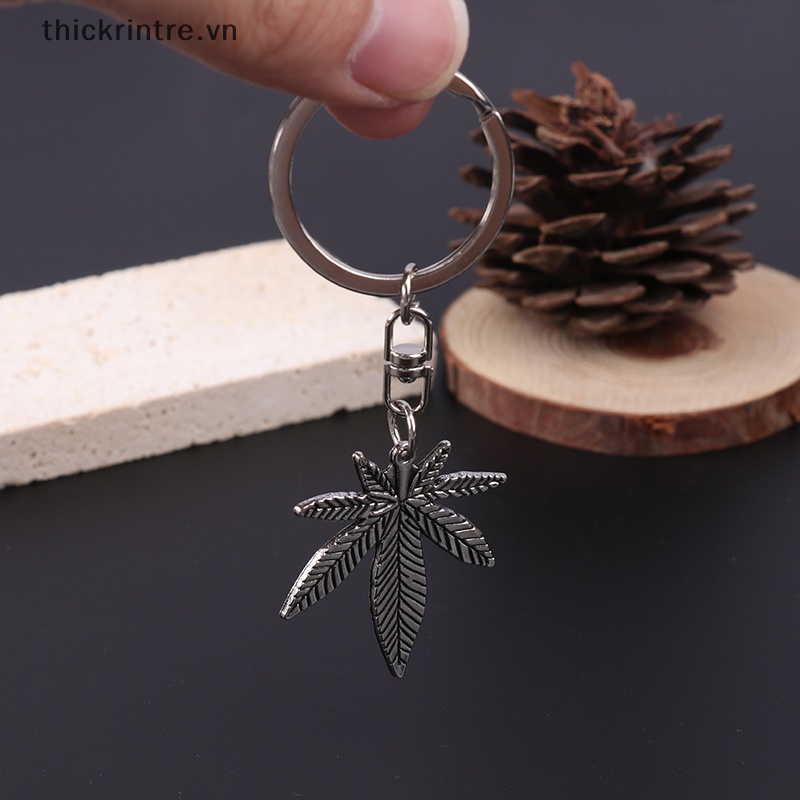 Móc Khóa Kim Loại Hình Lá Phong Màu Bạc Thời Trang