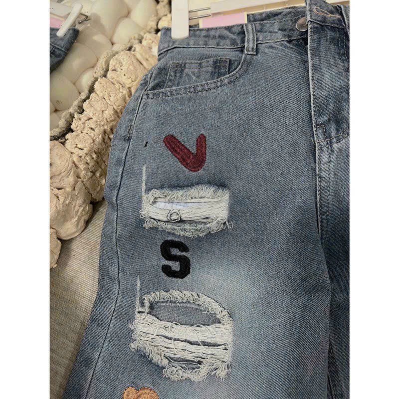 Quần Jean Suông Rách Thêu Chữ Nhiều Màu