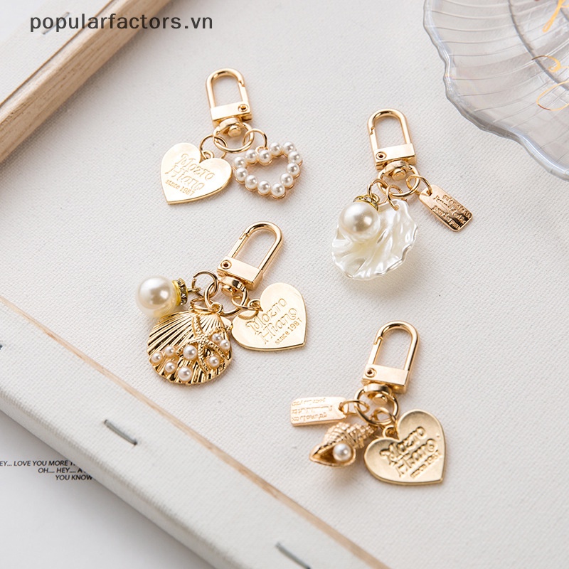Móc Khóa Hình Vỏ Sò Đính Ngọc Trai Thời Trang Dành Cho Nữ