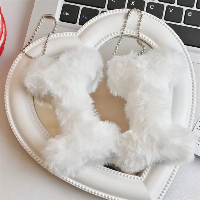 1 cái thoải mái động vật nhồi bông sang trọng móc khóa xương