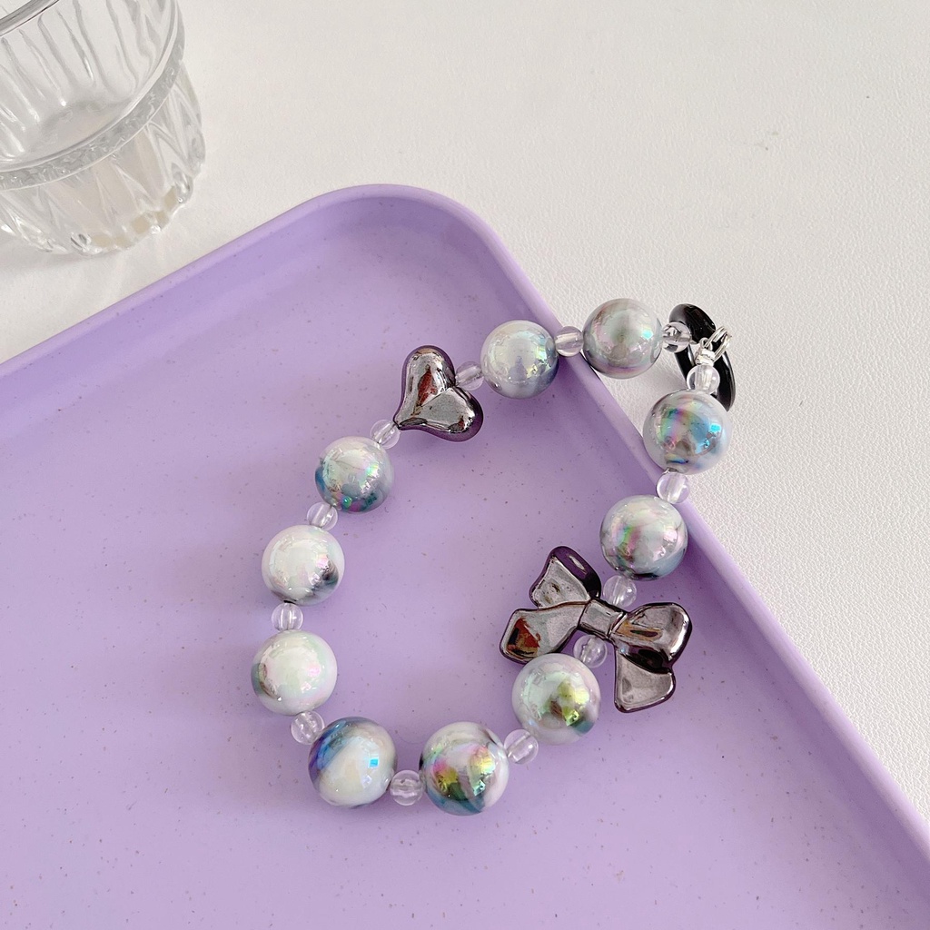 Vỏ Bảo Vệ Hộp Sạc Tai Nghe Bluetooth AirPods 1 2 gen3 pro2 2022 Bằng Silicon tpu Mềm Chống Trầy Hình Ngôi Sao Màu Tím Kèm Dây Đeo Chuỗi Ngọc Trai