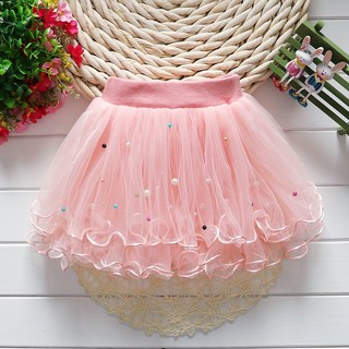 Váy lưới puffy váy xếp ly màu rắn của cô gái