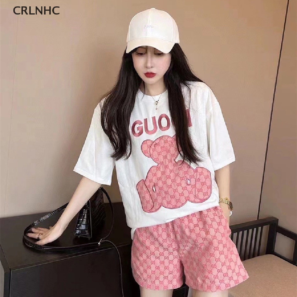 Set đồ CRLNHC gồm áo thun ngắn tay cổ tròn thêu họa tiết gấu và quần short thời trang mùa hè 2023