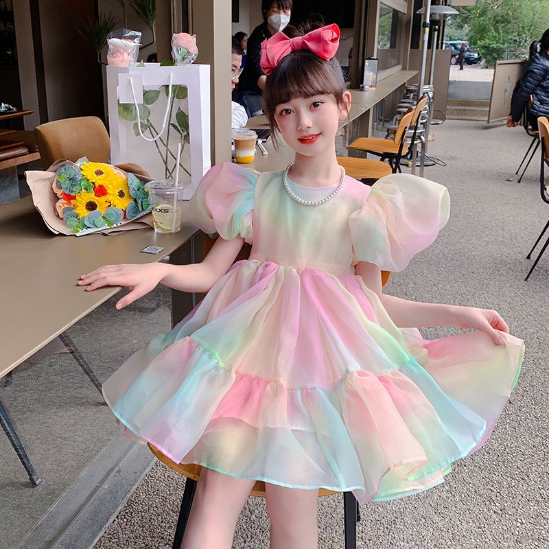 Đầm Công Chúa Phối Lưới Tay Phồng Đính Nơ Màu Cầu Vồng Thời Trang Mùa Hè Cho Bé Gái