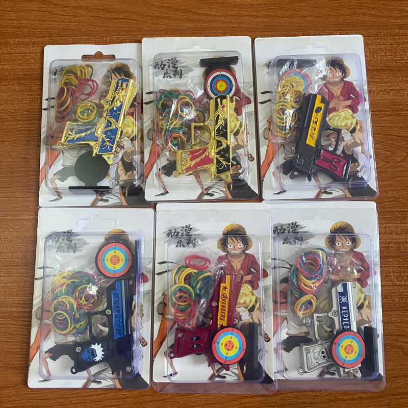 Đồ chơi bắn dây chun nịt loại to 12cm móc chìa khoá dạng đồ chơi cho trẻ em tặng kèm bia và dây chun