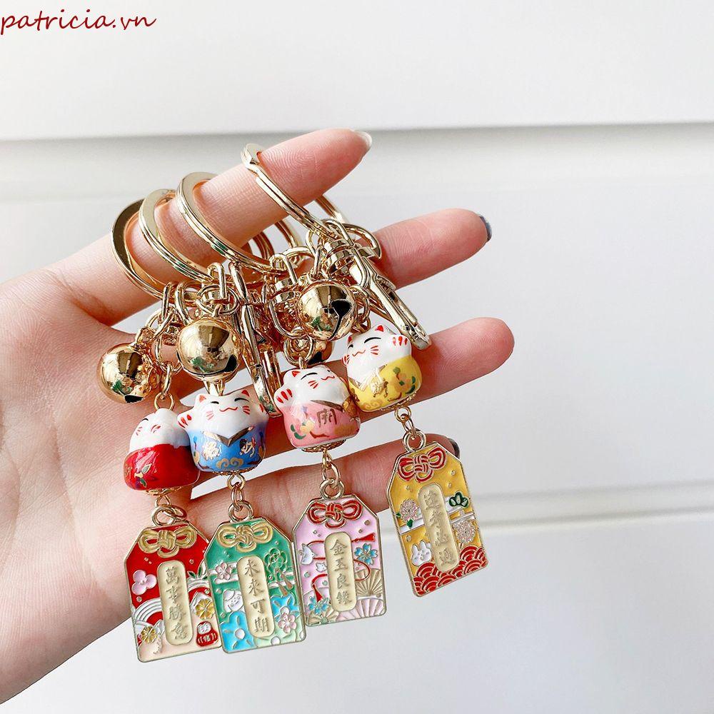 Móc Khóa Điện Thoại Di Động Hình Chú Mèo May Mắn Bằng Sứ Và Kim Loại