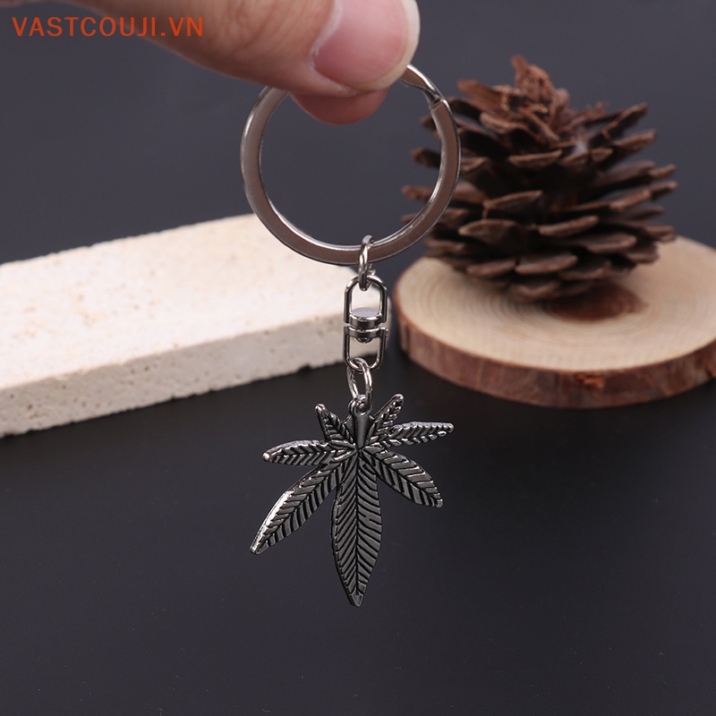 Móc Khóa Kim Loại Hình Lá Phong Màu Bạc Thời Trang