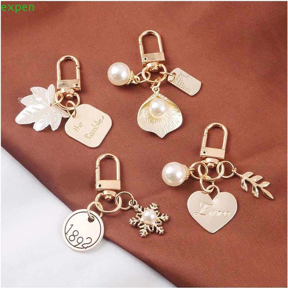 Móc Chìa Khóa Hình Trái Tim / Vỏ Sò / Chữ Cái Đính Ngọc Trai Phong Cách Hàn Quốc Sáng Tạo Cho Nữ