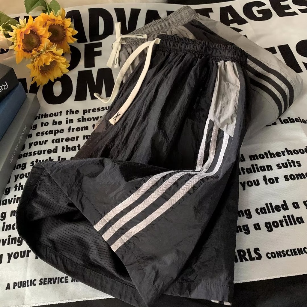 Quần ngắn ống rộng Phối Họa Tiết Kẻ Sọc Nhanh Khô Phong Cách Đường Phố Mỹ Thời Trang Mùa Hè Mới Cho Nam