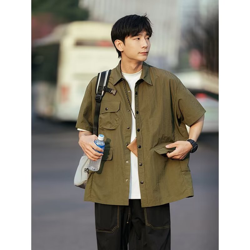 Áo Sơ Mi Tay Lửng Dáng Rộng Phối Nhiều Túi Cá Tính Cho Nam