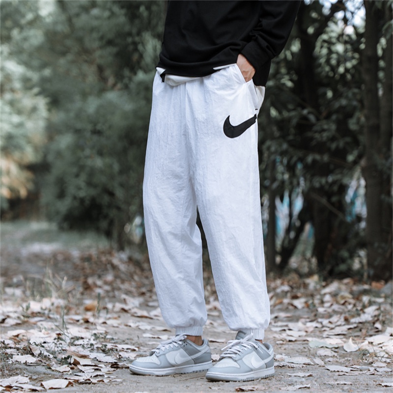 Quần Dài Thể Thao Thêu Logo Nyke 100% Chính Hãng Chất Liệu Nylon Co Giãn Thời Trang Cho Nam Và Nữ