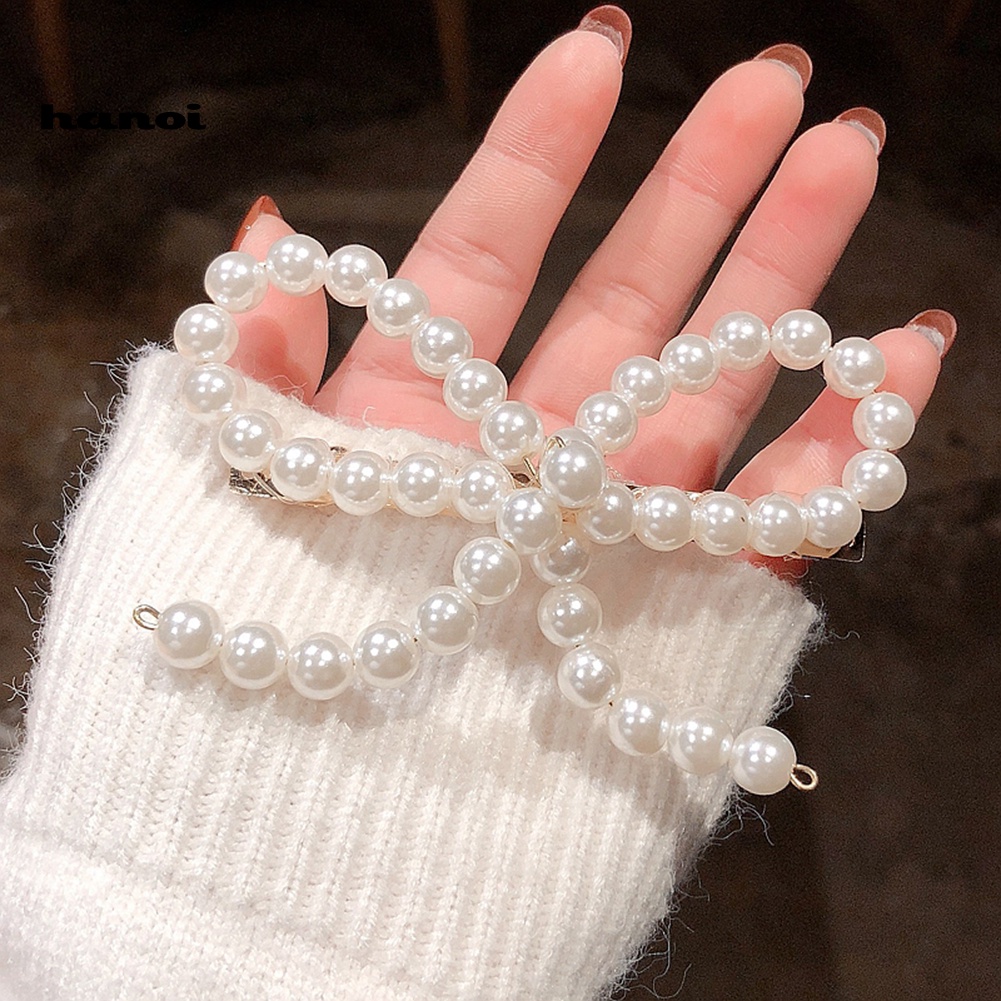 Kẹp Tóc Hình Nơ Đính Ngọc Trai Giả Toàn Diện Cho Nữ