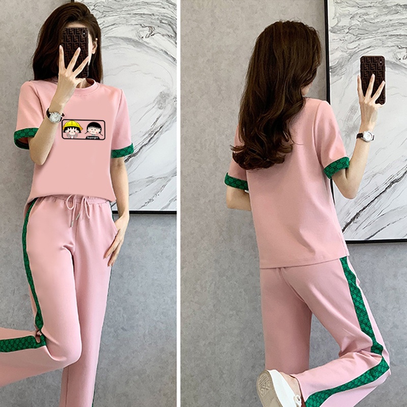 Bộ Đồ Thể Thao Áo Tay Ngắn Cổ Tròn Dáng Rộng In Hoạt Hình Phối Quần Dài Thời Trang Cho Nữ