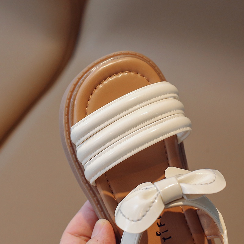 Xăng đan Hở Ngón Đế Mềm Chống Trượt Màu Trơn Thắt Nơ Đáng Yêu Cho Bé Gái 2-10 Tuổi