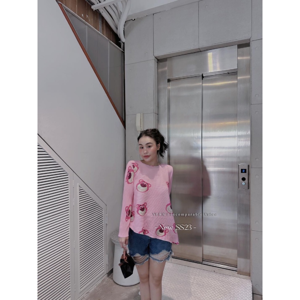 Áo dập ly hoạt hình xéo tà