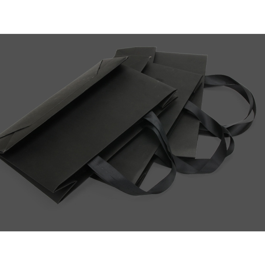 Túi giấy quai vải dán ẩn