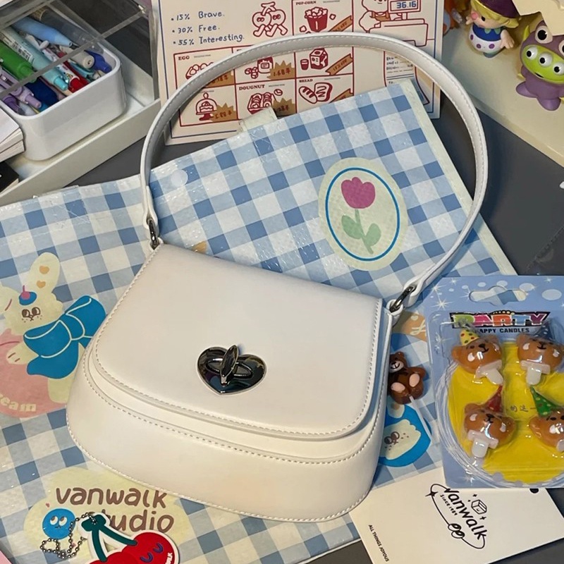 Túi Đeo Chéo Vai Có Khóa Hình Yên Ngựa Màu Trơn Dành Cho Nữ