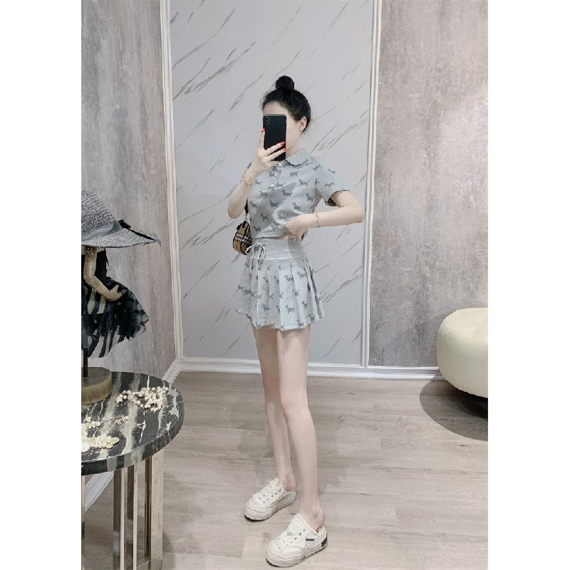 New Internet celebrity fashion folding collar polo shirt pleated skirt two-piece set small casual temperament short-sleeved T-shirt A- line skirt casual sports suit