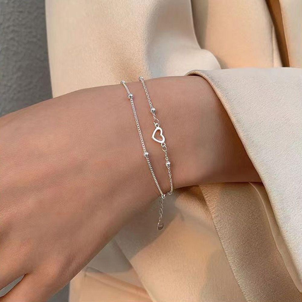 Vòng Tay Hai Lớp Bằng Thép Titan Mặt Hình Trái Tim Đơn Giản Cho Nữ