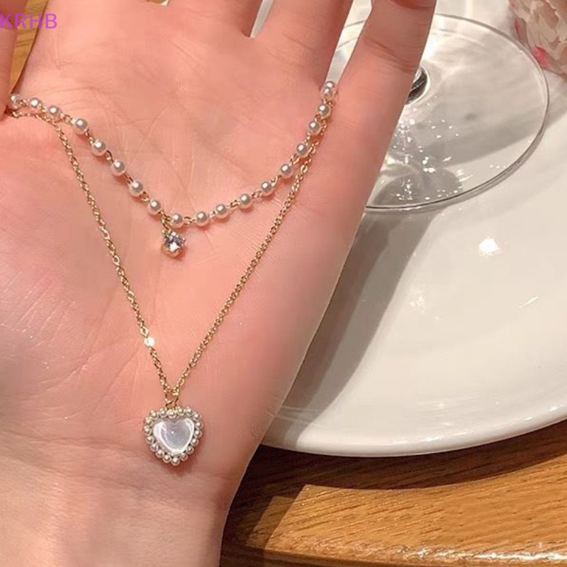 Vòng cổ Mặt Hình Trái Tim Đính Ngọc Trai Thời Trang Dành Cho Nữ Mới