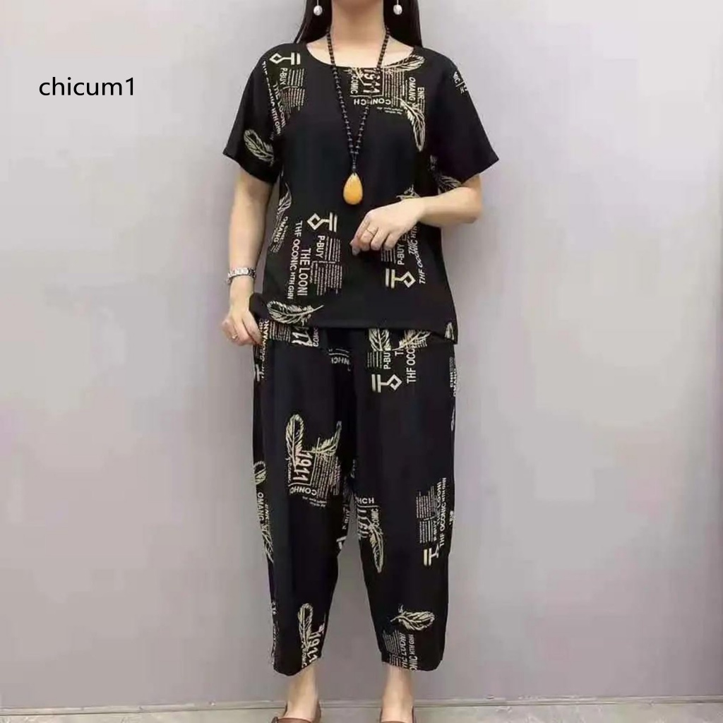 Bộ Đồ Ngủ 2 Món Áo Tay Ngắn Cổ Tròn Phối Quần Short Lưng Thun Mềm Mại Thoáng Khí In Họa Tiết Lông Vũ Thời Trang Mùa Hè Cho Nữ