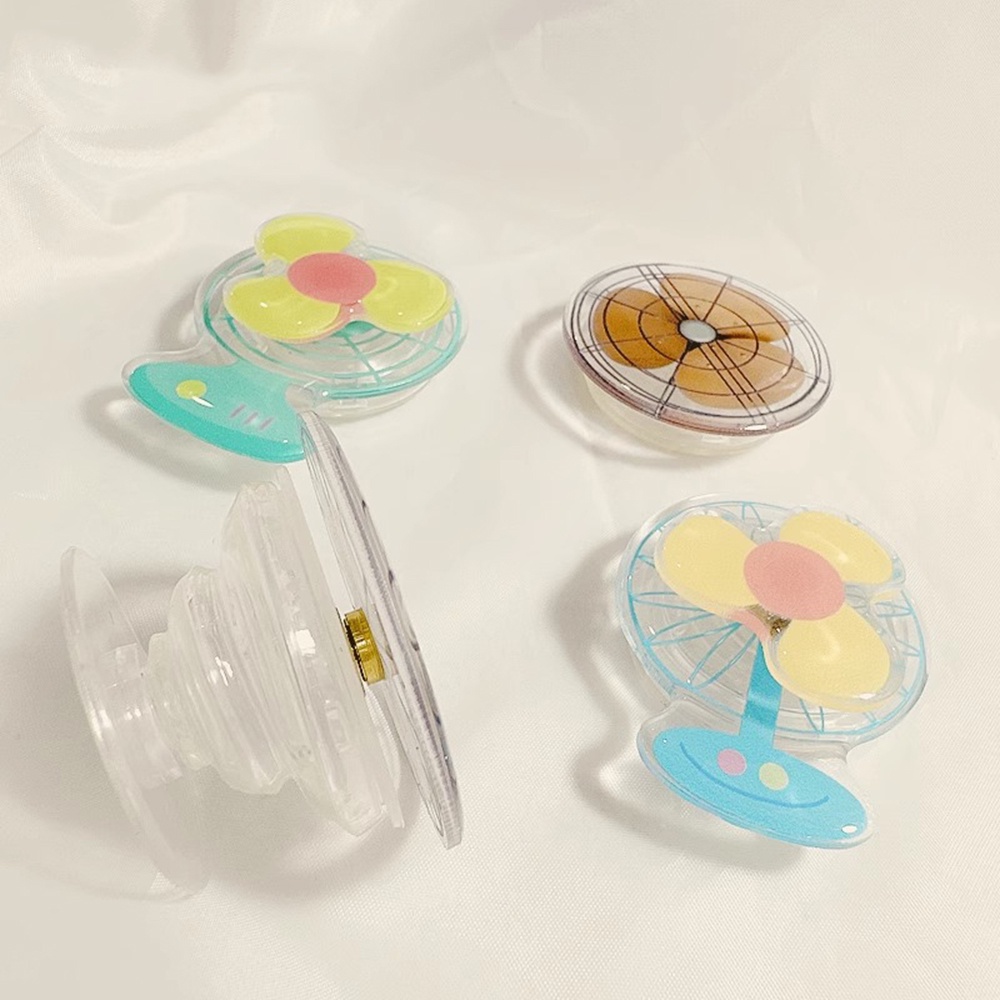 Giá Đỡ Điện Thoại Dạng Nhẫn Đeo Ngón Tay Màu Trơn Hình Tròn Có Quạt Xoay Thông Dụng Cho IPhone