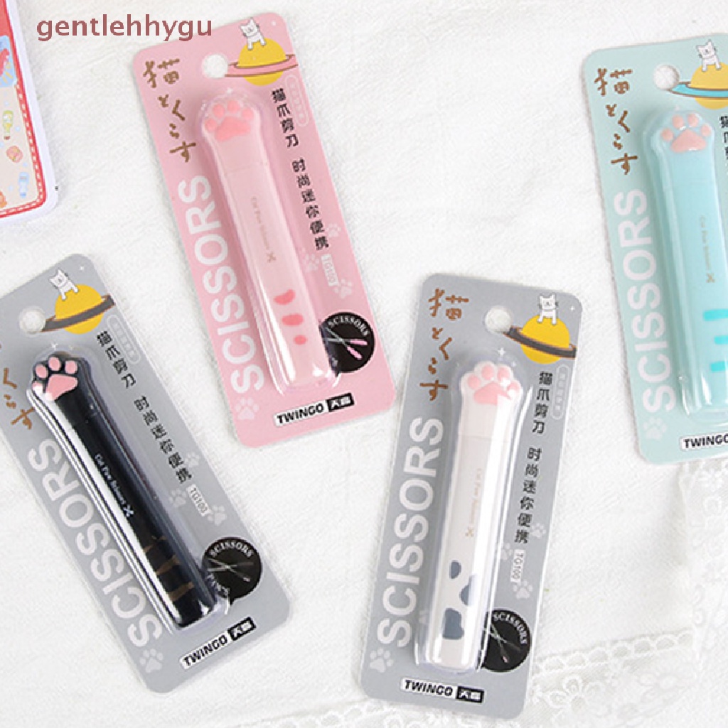 Kéo Cầm Tay Mini Bằng Thép Không Gỉ Hình Bàn Chân Mèo Dễ Thương