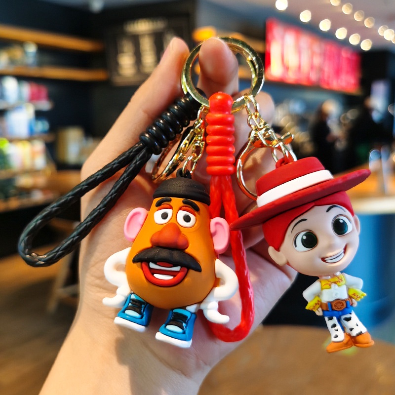 Móc Chìa Khóa Silicon Hình Hoạt Hình Toy Story Ba Mắt Cho Học Sinh