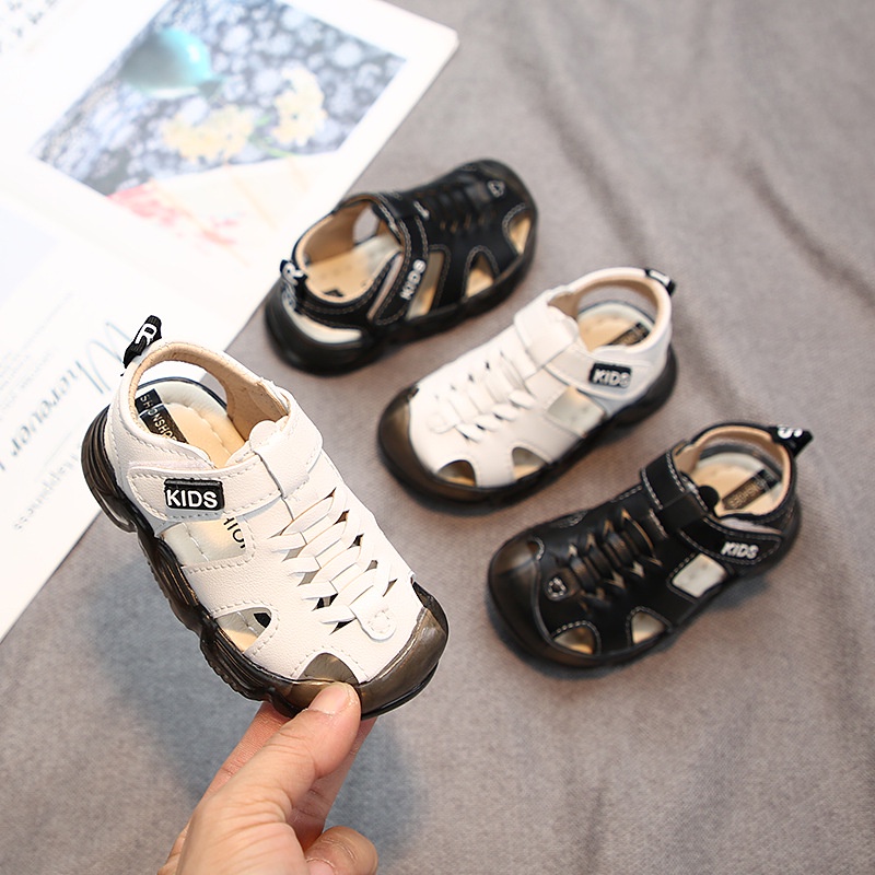 Dép tập đi cho bé, Sandal rọ bé trai bé gái quai dán chất da PU thoáng khí bảo vệ mũi chân chống vấp cho bé T12