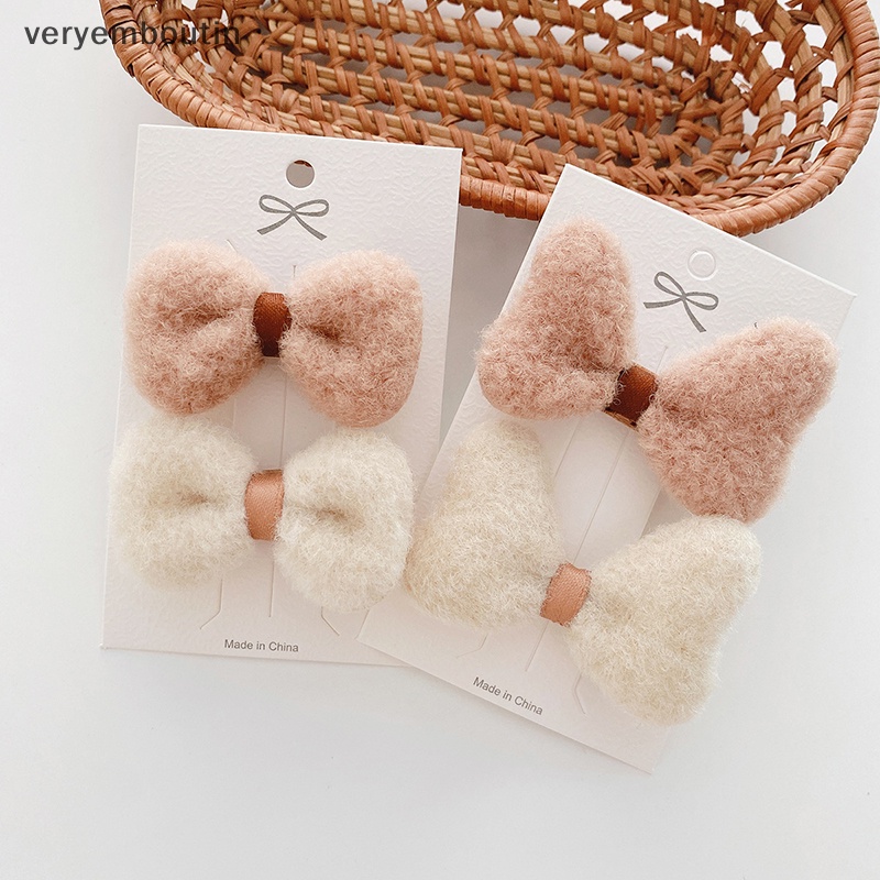 Bộ 2 Kẹp Tóc Vải Lông Mềm Đính Nơ Xinh Xắn Cho Bé Gái