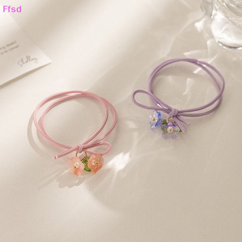 {Ffsd} Set 2 Vòng Tay Dây Co Giãn Mặt Hoa Màu Xanh Lá / Hồng Ngọt Ngào Cho Nữ