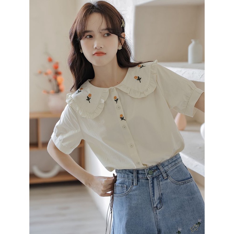 Búp bê cổ bong bóng tay áo thêu cho phụ nữ Pháp Vintage College Wind Top
