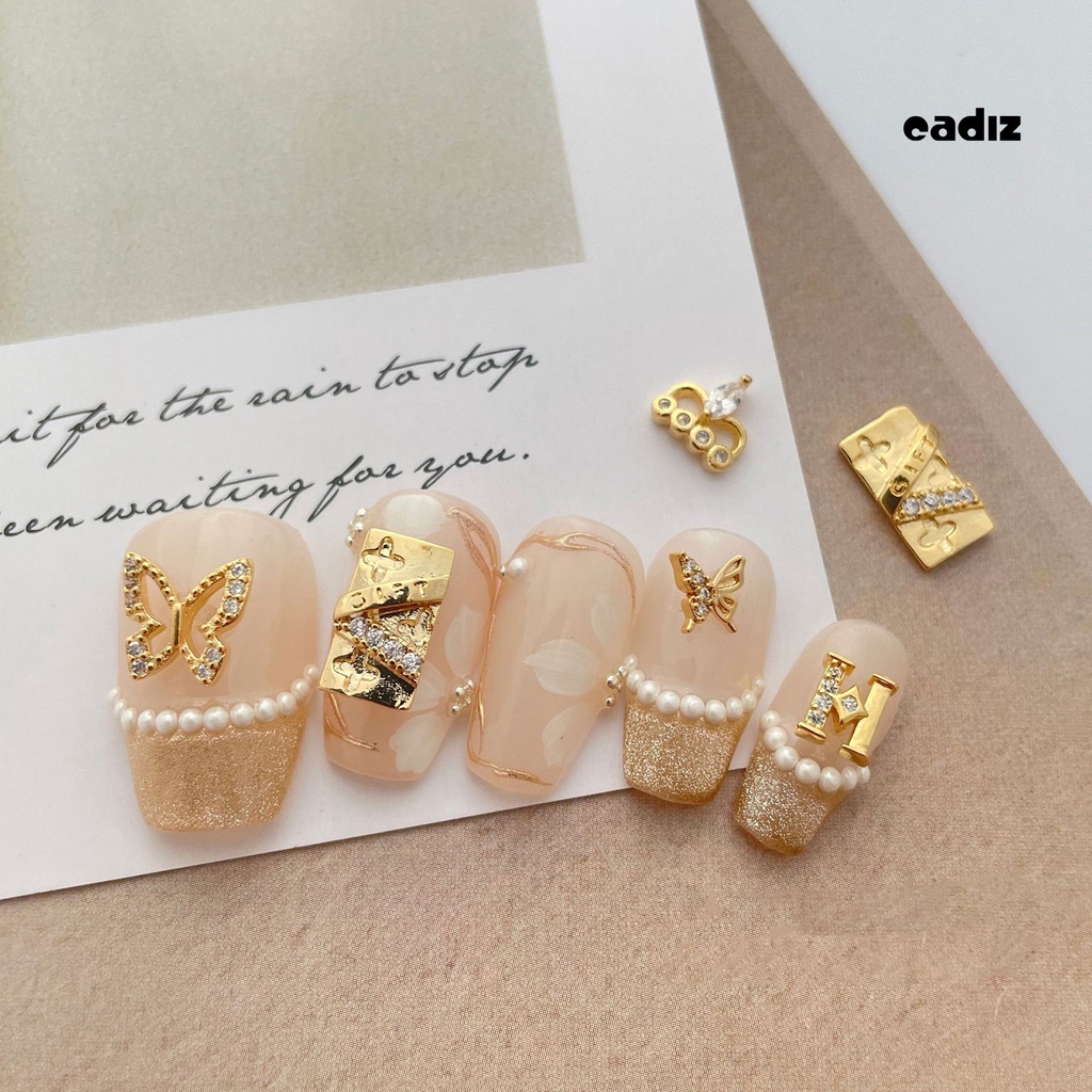 Set 10 Phụ Kiện Trang Trí Móng Tay Nghệ Thuật Hình Học Bướm Vương Miện Rỗng Bằng Kim Loại Cá Tính