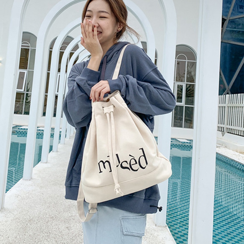 Ba Lô Rút Dây Bằng Vải Bạt Đơn Giản Sức Chứa Lớn In Chữ Thời Trang Phong Cách Hàn Quốc Cho Nữ