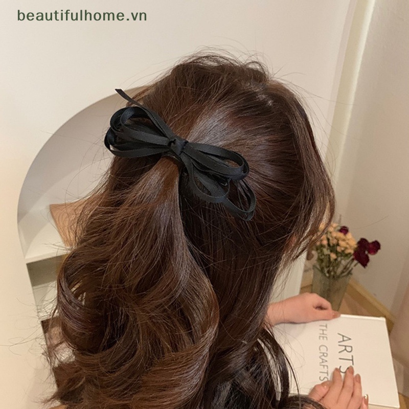 1 Kẹp Tóc Hình Nơ Ruy Băng Màu Đen Xinh Xắn Cho Nữ