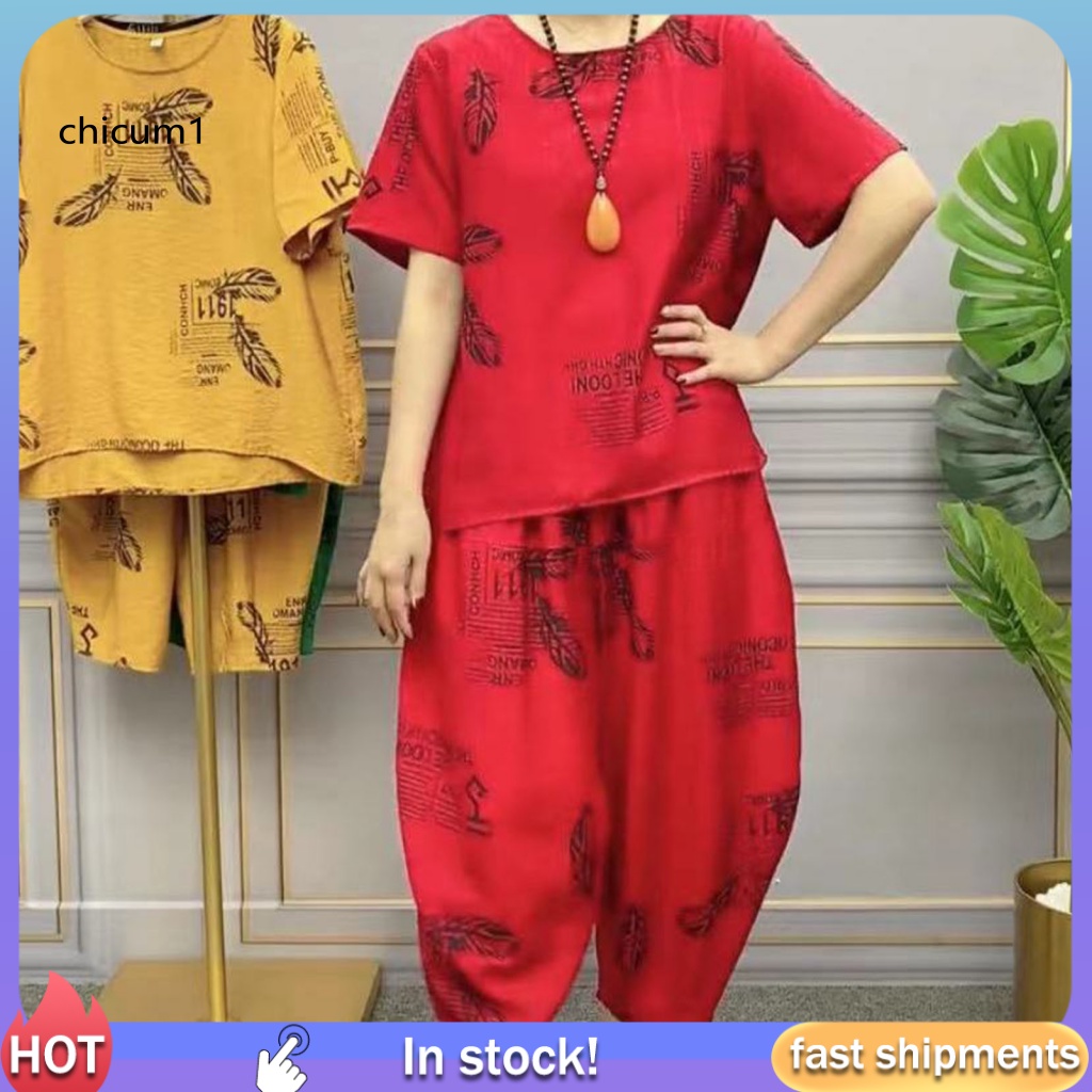 Bộ Đồ Ngủ 2 Món Áo Tay Ngắn Cổ Tròn Phối Quần Short Lưng Thun Mềm Mại Thoáng Khí In Họa Tiết Lông Vũ Thời Trang Mùa Hè Cho Nữ