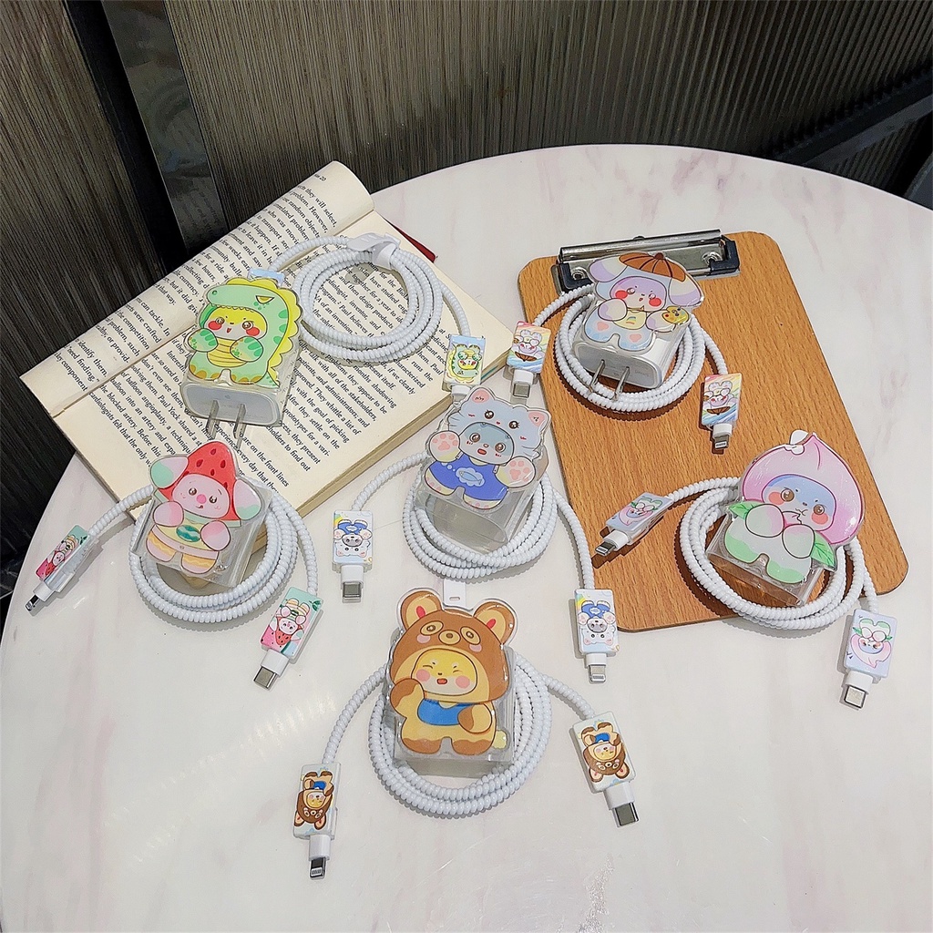 1 Bộ 5 Miếng Dán Hoạt Hình Dễ Thương Bằng Silicon tpu Mềm Chống Sốc Cho Apple iphone / ipad 18W / 20W