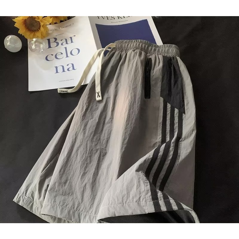 Quần ngắn ống rộng Phối Họa Tiết Kẻ Sọc Nhanh Khô Phong Cách Đường Phố Mỹ Thời Trang Mùa Hè Mới Cho Nam