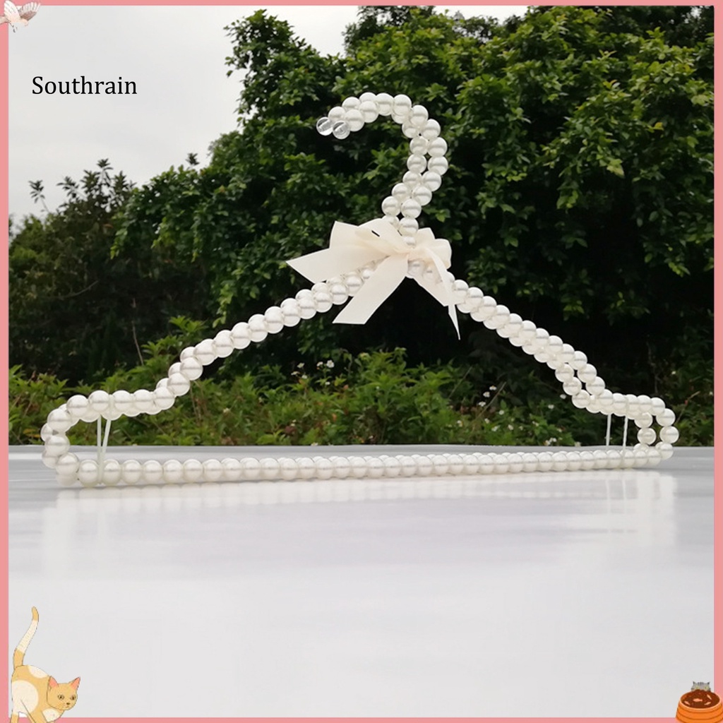 Set 2 Móc Treo Quần Áo Đính Nơ Và Ngọc Trai Nhân Tạo Bằng Nhựa Tiện Lợi