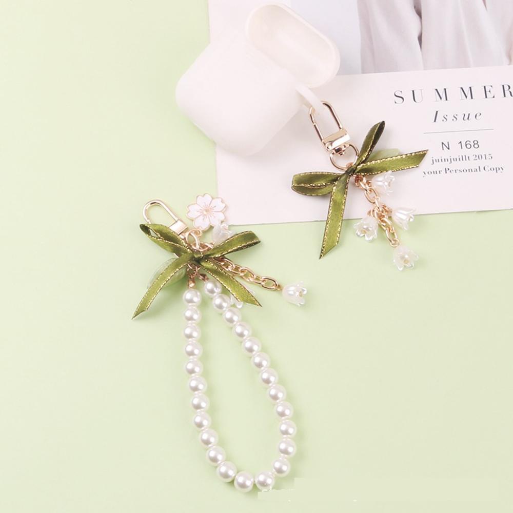 Ốp Điện Thoại Hình Hoa Lily Đính Ngọc Trai Kèm Móc Khóa Độc Đáo Trang Trí Túi Xách